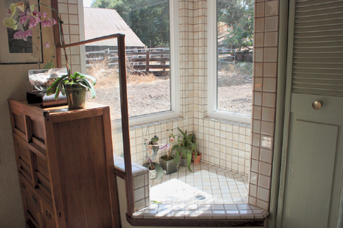 A bathroom expansion in a Frank Lloyd Wright Inspired Ranch House in Martinez CA