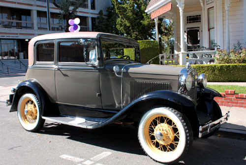 A classic car parked at the Martinez Museum during the Martinez Historic Home Tour