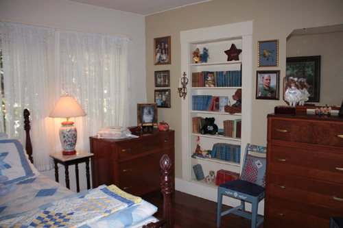 The bookcase is actually a secret door to another room.  Martinez, CA.