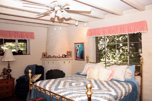 Beehive fireplace in a bedroom of a 1945 Adobe House in Martinez, CA