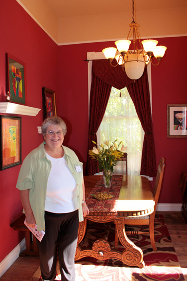 Red dining room walls in a Victorian Cottage on The Martinez Home Tour